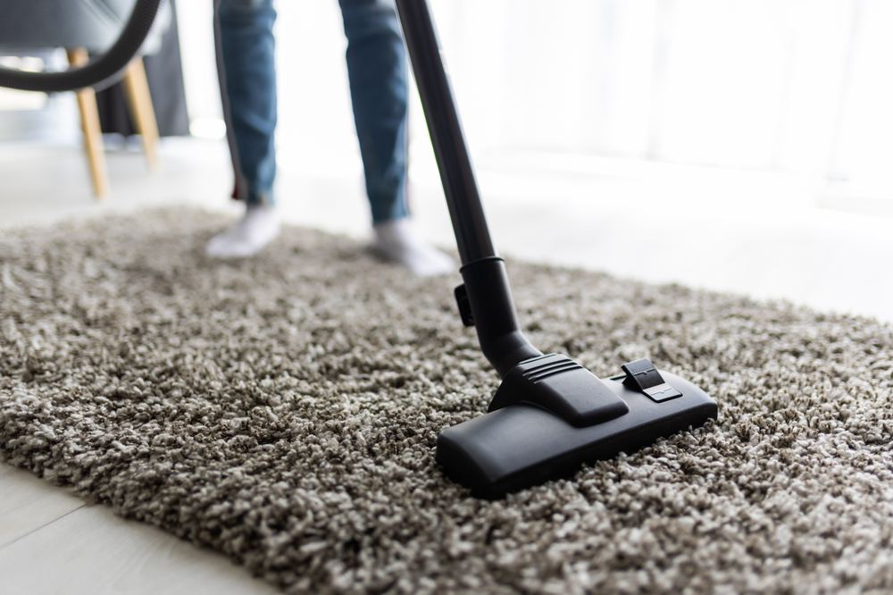 Vacuuming a carpet